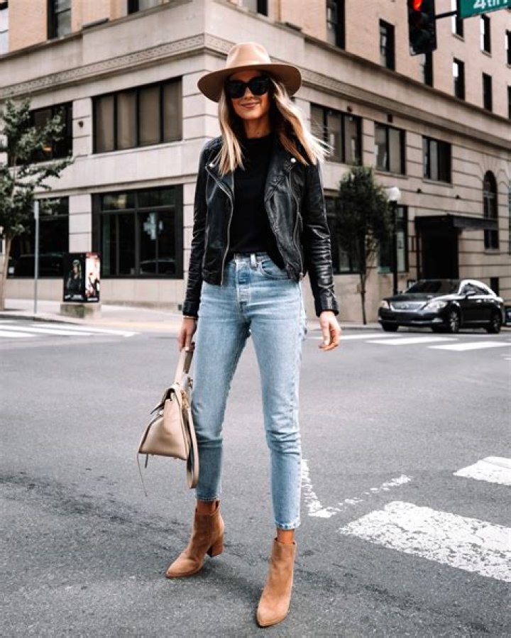 Blonde Women with Green Eyes: The Allure of Leather Jackets, Jeans, and Boots